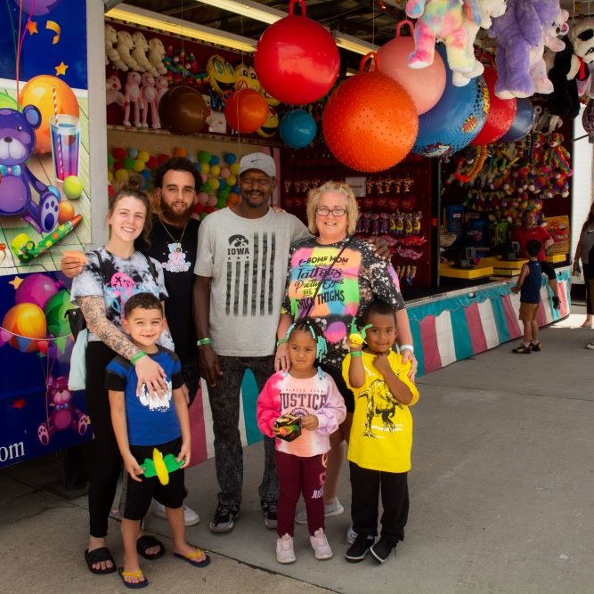 A family at the Tug Fest carnival